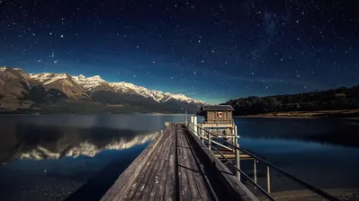 دانلود والپیپر نیوزلند پل و کوه و کهکشان New Zealand Night Sky